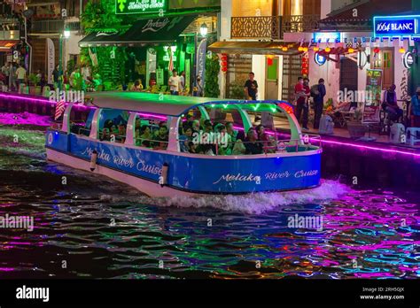 Malacca River Cruise boat sailing down the Malacca river at night Stock ...