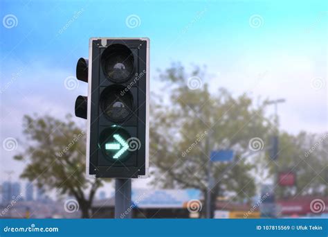 Green Right Arrow Traffic Light Stock Image - Image of urban, black ...