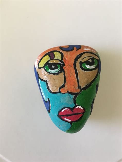 Rock painting/face | Stone art, Stone painting, Rock painting patterns