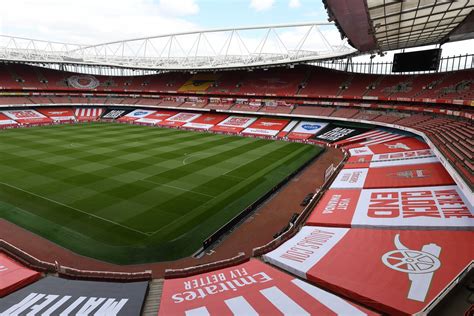 Arsenal prepare Emirates Stadium with banners and tributes to 47 fans lost to coronavirus ...