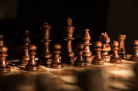 Browse Free HD Images of Dark Wooden Chess Pieces Against A Black ...