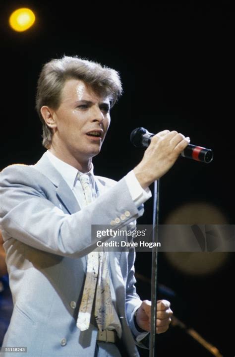 English singer-songwriter David Bowie performs at the Live Aid... News ...