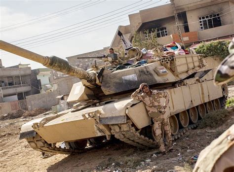 Well deserved bit of rest for this battered but alive & kicking Iraqi M1A1 Abrams MBT in Mosul.