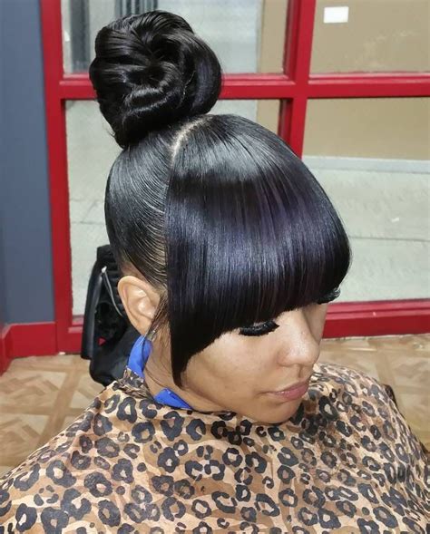 High Bun Hairstyles With Bangs For Black Women