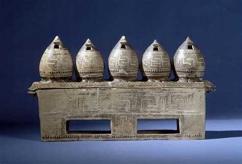 Athenian (Attic) Geometric chest with five model "granaries" on the lid ...