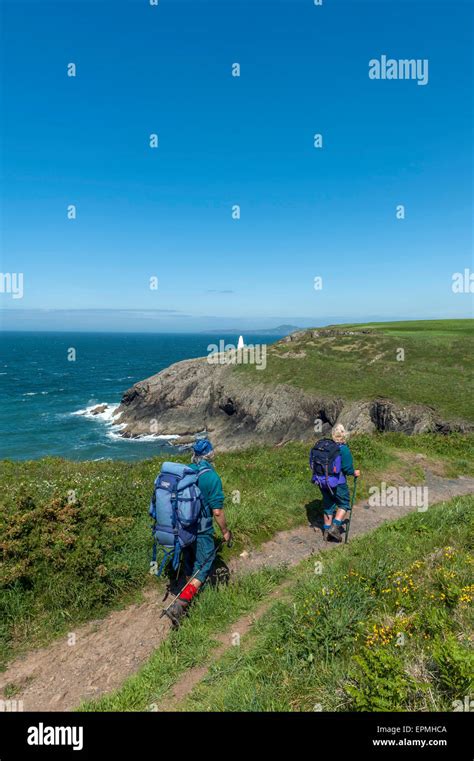 Hikers along the Pembrokeshire coastal path near Porthgain. Pembrokeshire. Wales. Cymru. UK ...