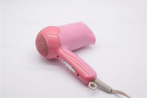 Pink hair dryer 13584011 Stock Photo at Vecteezy