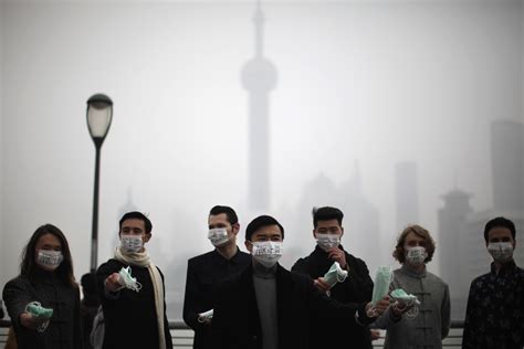 Acrid smog returns to envelop Beijing for fourth time in a month ...