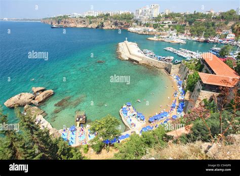 Turkey, Antalya, beach and tourists along the coast of Kaleici Stock ...