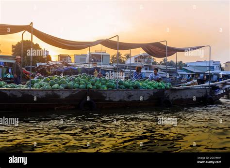 Sunrise at Cai Rang Floating Market with watermelons Stock Photo - Alamy