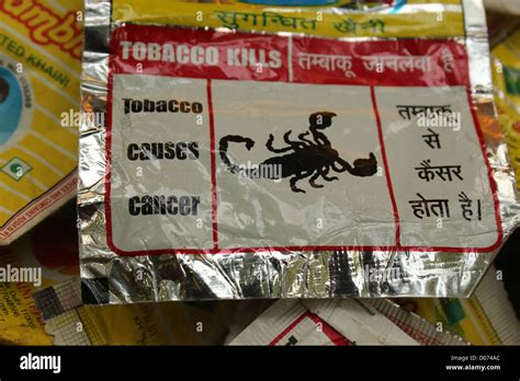 Chew tobacco cover warning shambu khaini Stock Photo - Alamy