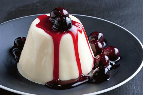 Lemon panna cotta with vodka blueberry syrup