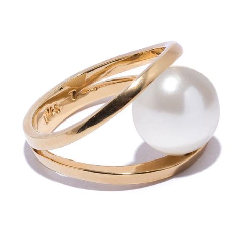 THIS CLASSIC PEARL RING IS MODERN AND AIRY, WITH A 12MM GLASS PEARL ...