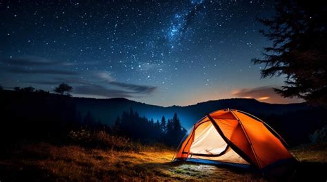 Premium AI Image | camping in the mountains the night sky with stars