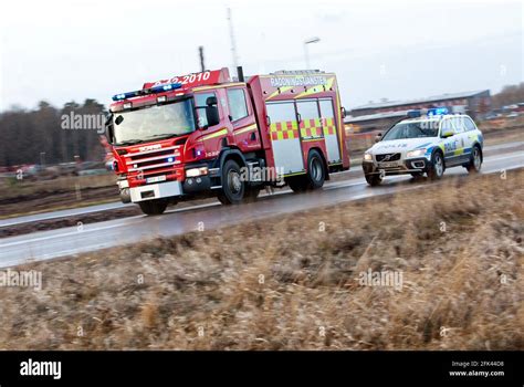 A police car and a rescue vehicle from the rescue service during an ...