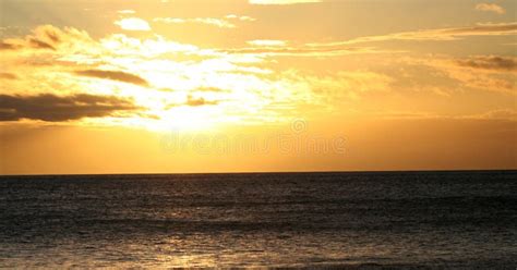 Sunset in gold stock image. Image of peaceful, waves, golden - 2100443