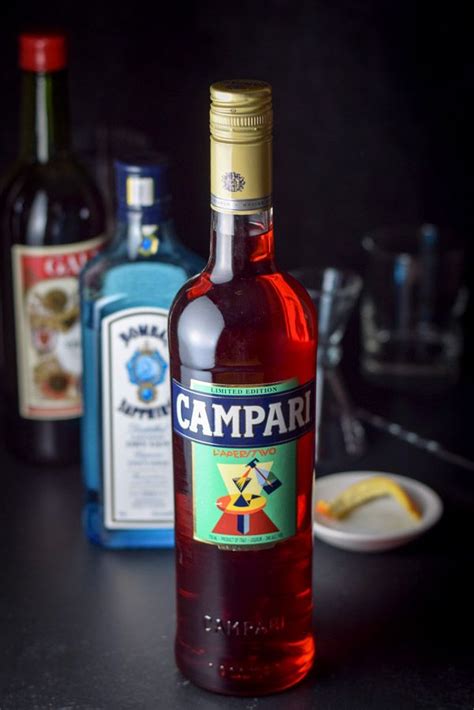 Campari, gin and sweet vermouth ready to be mixed into the negroni aperitif cocktail | Negroni ...