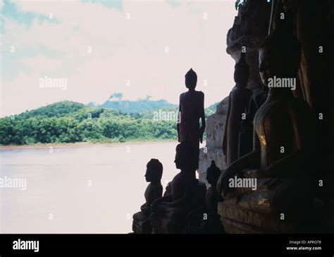 Buddha statues, Pak Ou caves, Laos Stock Photo - Alamy