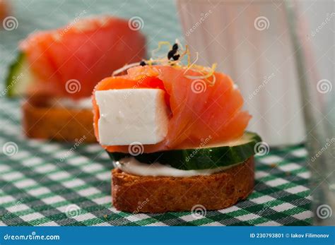 Canape with Salmon, Young Cheese, Cucumber Stock Image - Image of ingredients, cheese: 230793801