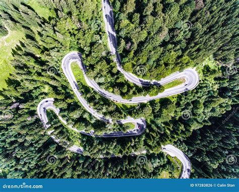 Winding road in the forest stock photo. Image of road - 97283826