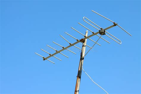 Old TV Antenna on House Roof with Blue Sky. Stock Photo - Image of directional, receiver: 48902846