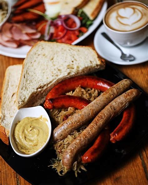 Breakfast of the champs! Bavarian sausage plate with two types of sausage sauerkraut and mustard ...