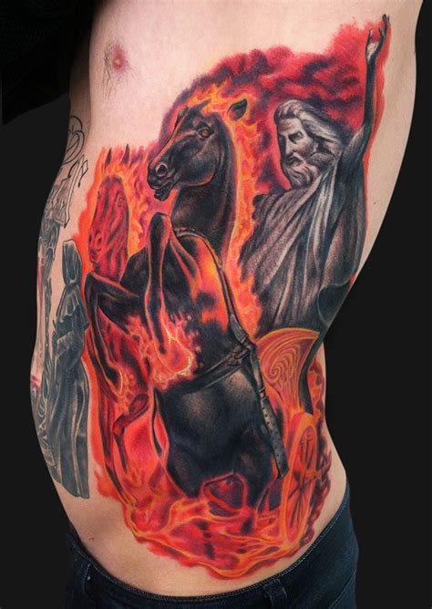 Colored fantasy style side tattoo of horse rider with flames - Tattooimages.biz