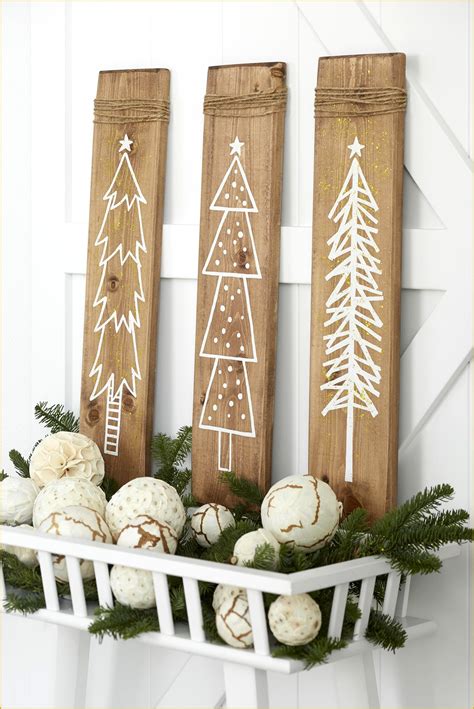 19 Gorgeous Farmhouse Christmas Crafts to Make This Holiday Use pine boards to add a touch of ...