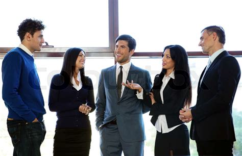 Group of business people talking in the office | Stock image | Colourbox