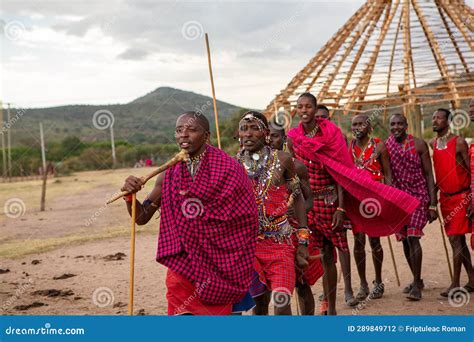 Masai in Traditional Colorful Clothing Showing Maasai Jumping Dance at ...