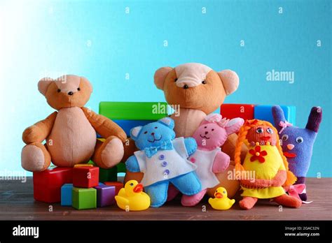 Pile of toys on blue background Stock Photo - Alamy