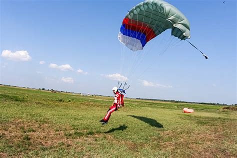 Parachute Landing Stock Photos, Pictures & Royalty-Free Images - iStock