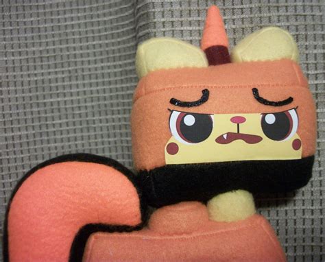 Orange Unikitty plush toy approximately 6.5 by ChaPowStudios