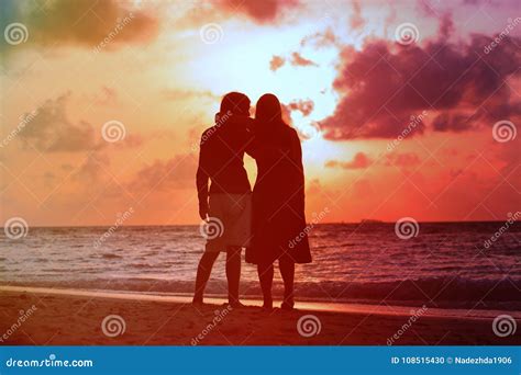 Young Romantic Loving Couple Hug at Sunset Beach Stock Photo - Image of leisure, summer: 108515430