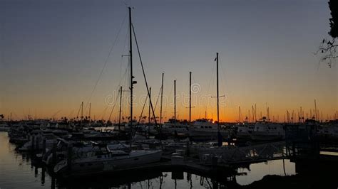 Sailboats Tethered at the Marina Dock at Sunset in San Diego California ...