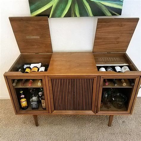 Mid Century bar repurposed from a Motorola console stereo in a Drexel Declaration cabinet ...