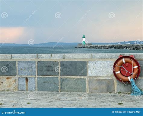 View from the Pier To the Green and White Lighthouse Ostmolenfeuer of ...