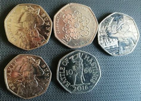 COLLECTION OF RARE 50P COINS.