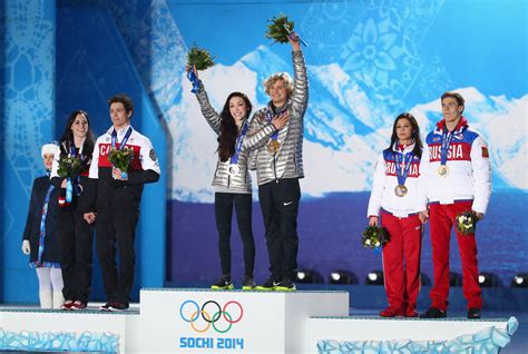 Tessa Virtue Photos Photos - Winter Olympics: Medal Ceremonies - Zimbio