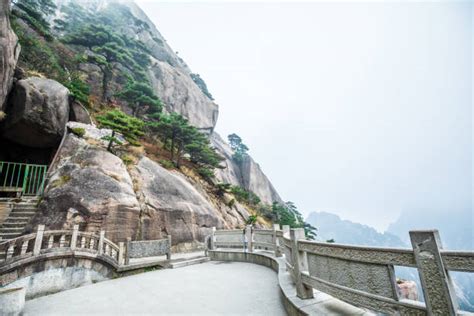 240+ Walkway Through The Fog In Huangshan Stock Photos, Pictures ...