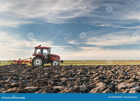 Tractor plowing field stock photo. Image of plowed, humus - 35052340