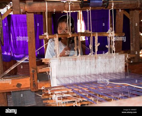 silk weaver working her loom at Inle Lake in Myanmar Stock Photo - Alamy