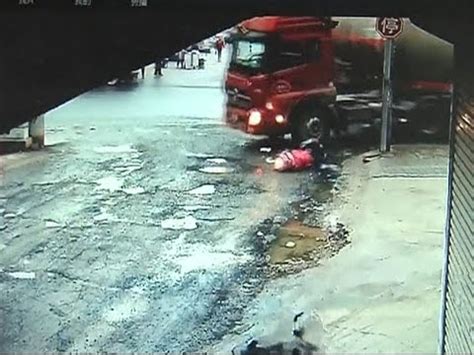 Two Girls Survive Truck Crash Without Severe Injuries in East China - YouTube