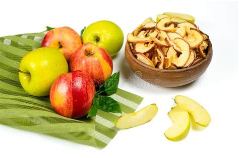 Dry Apple Slices in a Bowl and Fresh Apples on White Background ...