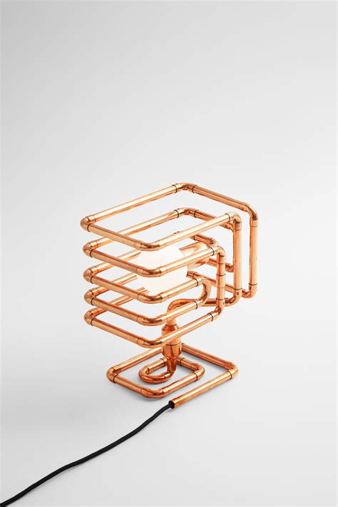 Cool desk lamp in trendy copper metal finish inspired by retro futuristic design manufactured by ...