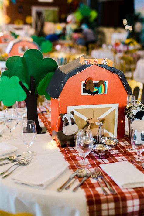a farm themed table setting with place settings