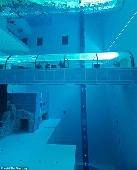 Hold your breath: The world's deepest pool goes 137 FEET below the surface and is filled with ...