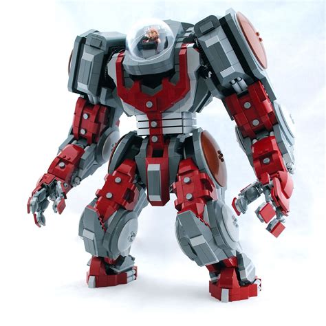 a lego robot that looks like it is made out of red and grey bricks,