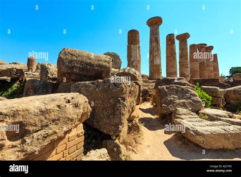 Ruined Temple of Heracles columns in famous ancient Valley of Temples, Agrigento, Sicily, Italy ...