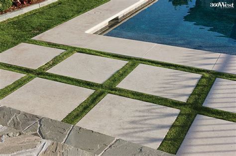 These Lueders limestone pavers are inset into the lawn to define the ...